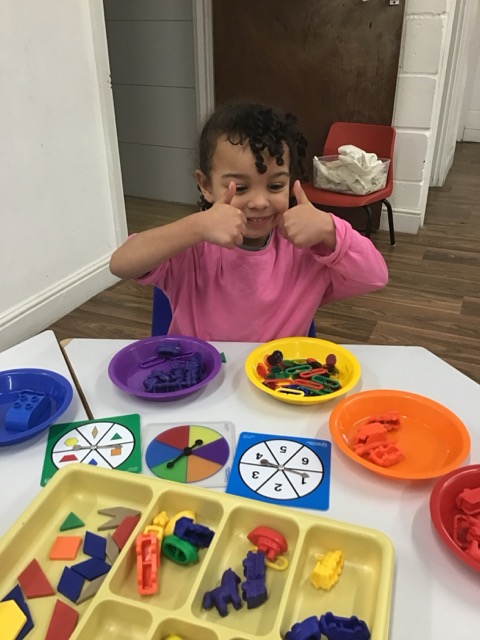 Young learners exploring educational materials and toys